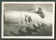 Howard L. Zacher in his plane Margie.